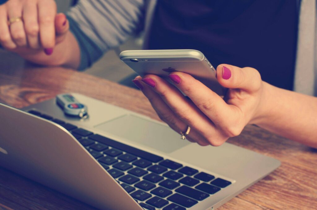 Restaurant owner looking at emails phone gecko hopitality